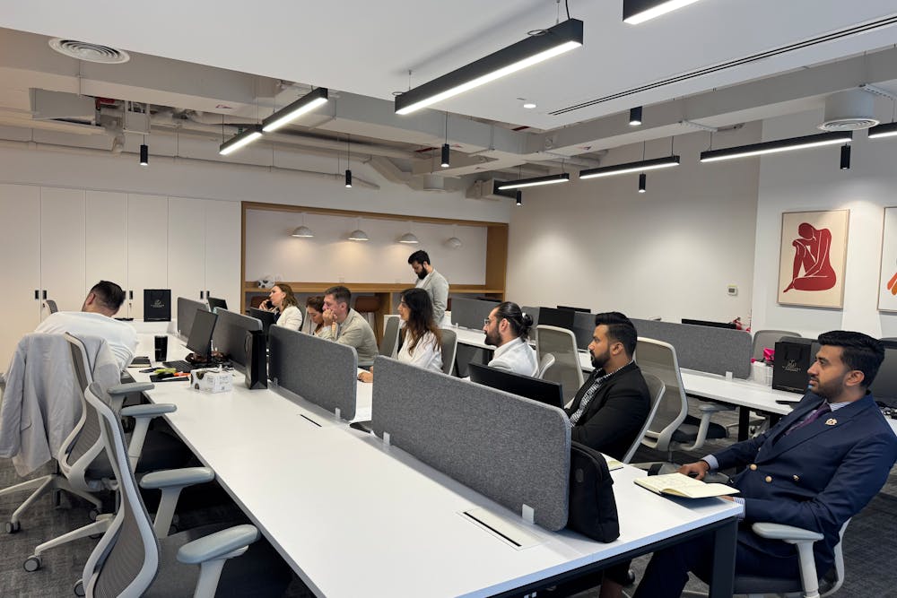 A modern shared workspace with multiple hotdesking working stations